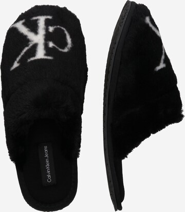 Calvin Klein Slippers in Black