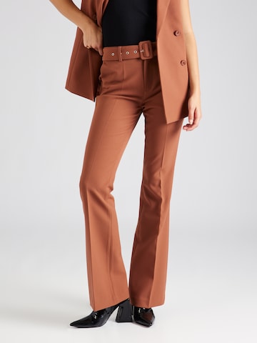 ABOUT YOU x Iconic by Tatiana Kucharova Flared Pleated Pants 'Farina' in Brown: front