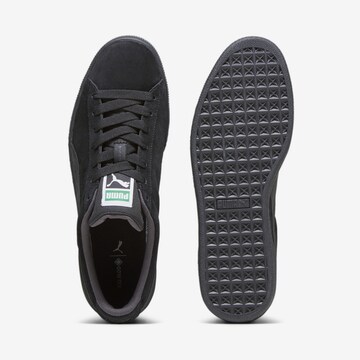 Baskets basses PUMA en noir