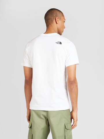 T-Shirt 'NEVER STOP EXPLORING' THE NORTH FACE en blanc