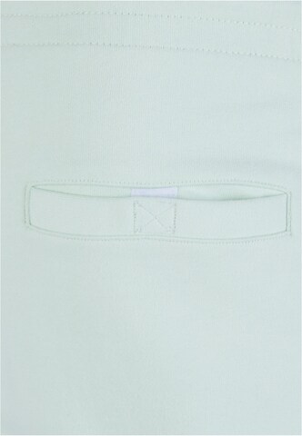 Tapered Pantaloni di Urban Classics in verde