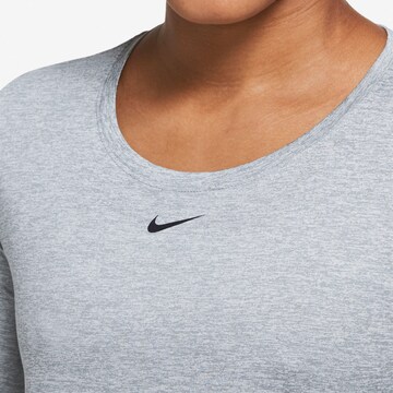 NIKE - Camiseta funcional 'One' en gris