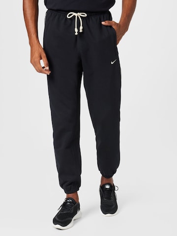 NIKE - Loosefit Calças de desporto em preto: frente