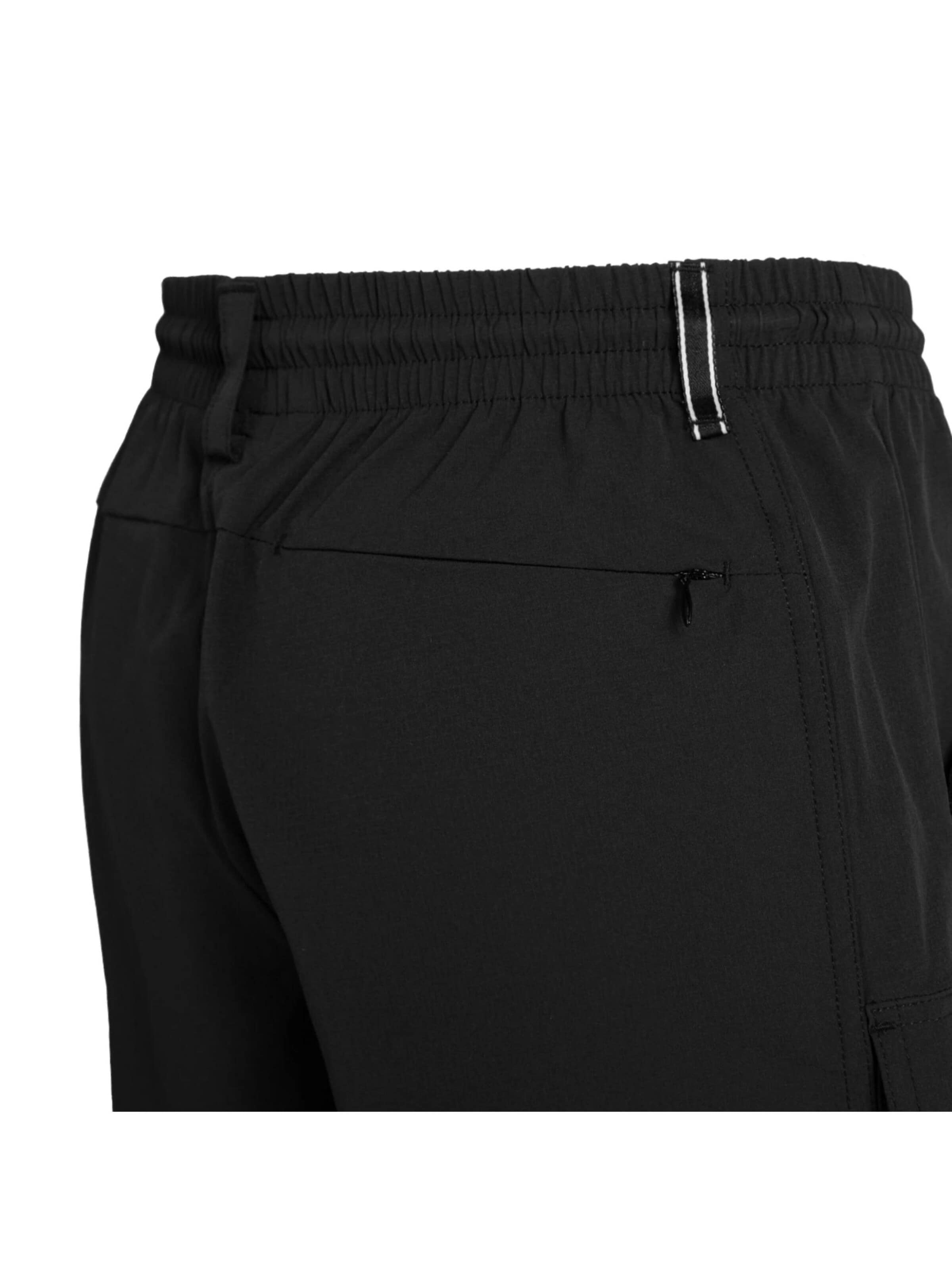 regular Pantaloni sportivi di Izas in nero