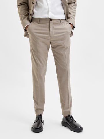 Coupe slim Pantalon à plis SELECTED HOMME en beige : devant