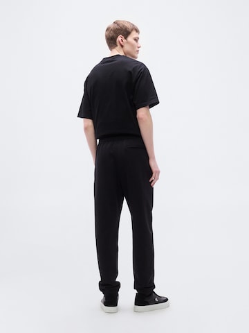 Effilé Pantalon 'NANO' Calvin Klein en noir