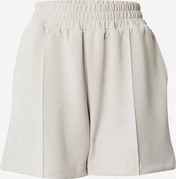 Athlecia - Pierna ancha Pantalón deportivo 'Jacey' en beige: frente