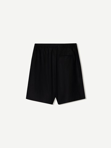 Bershka Loosefit Housut värissä musta