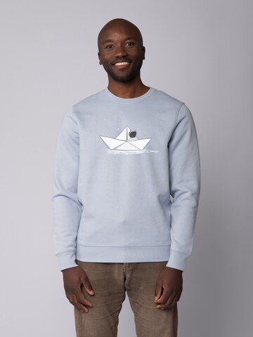 Watapparel Sweatshirt ' Astronaut in paper boat ' in Blauw: voorkant