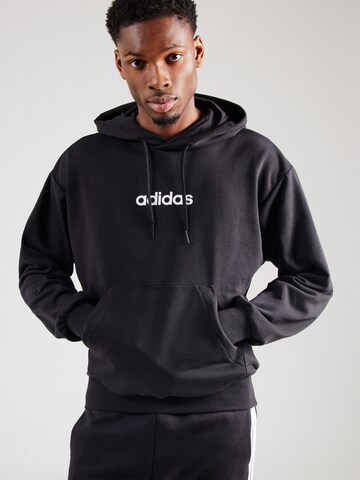 ADIDAS SPORTSWEAR Αθλητική μπλούζα φούτερ σε μαύρο: μπροστά