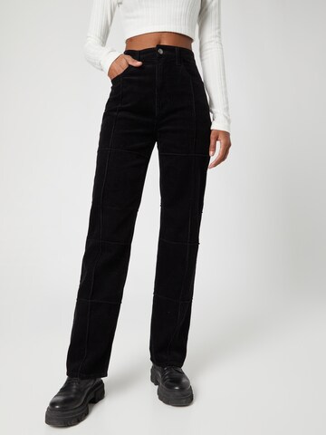 florence by mills exclusive for ABOUT YOU Regular Trousers 'Foxglove' in Black: front