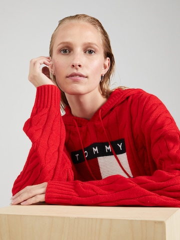 Pull-over Tommy Jeans en rouge