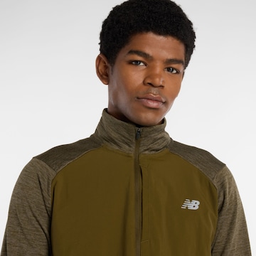 new balance Functioneel shirt 'Athletics' in Bruin