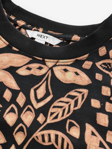 Robe Next en noir