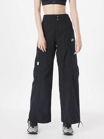 Wide leg Pantaloni cu buzunare de la Nike Sportswear pe negru: față