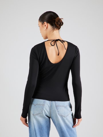 Sisley - Blusa en negro