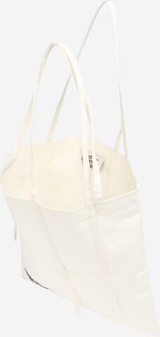 ABOUT YOU REBIRTH STUDIOS Τσάντα πουγκί 'Strappy Tote Bag' σε μπεζ