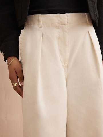 Next Loose fit Pleat-front trousers in Beige