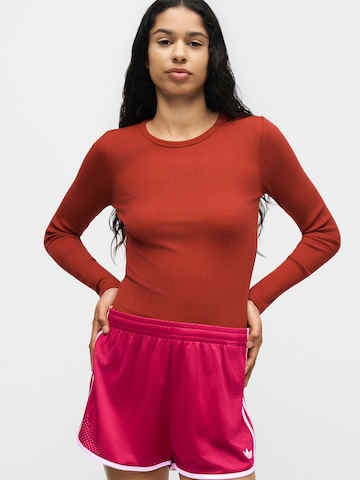 ADIDAS ORIGINALS - regular Pantalón 'SPRINTER' en rojo