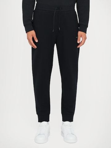 ARMANI EXCHANGE Tapered Trousers in Blue: front