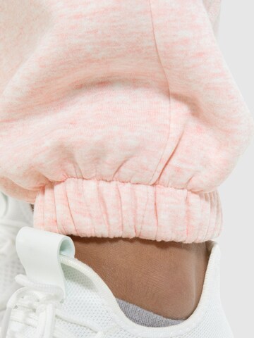 Effilé Pantalon de sport 'Amelia' Smilodox en rose