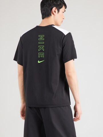 Nike Sportswear - Camisa em preto: frente