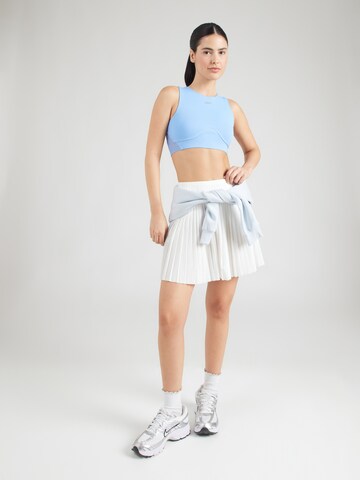 Reebok - Top deportivo en azul