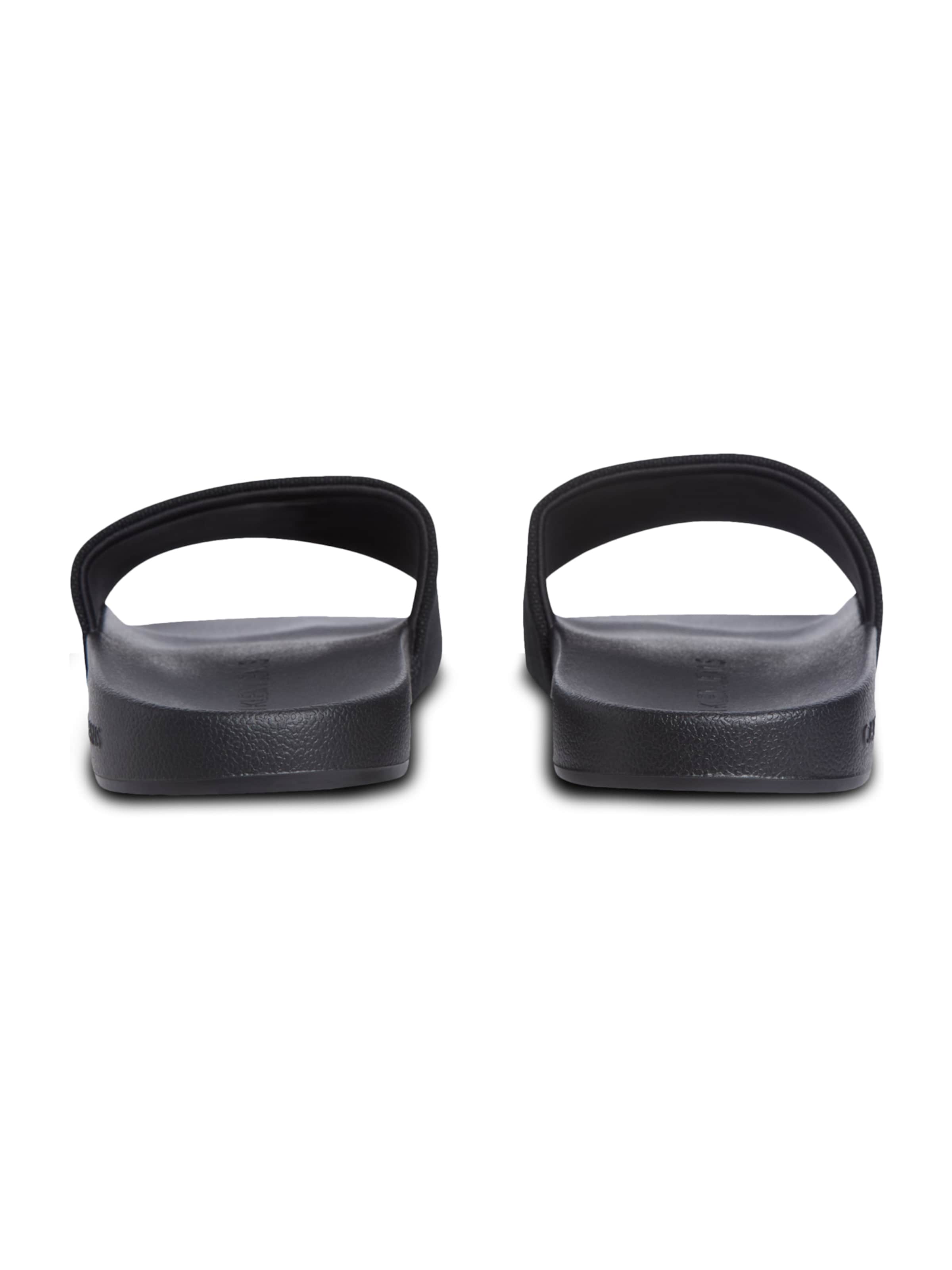 Calvin Klein Šľapky - Čierna