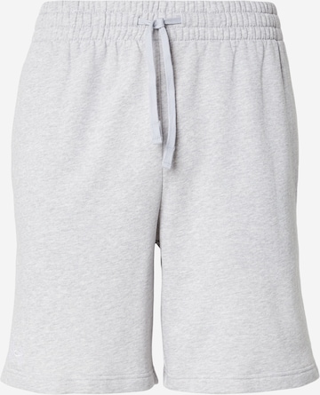 UNDER ARMOUR Regular Workout Pants in Grey: front