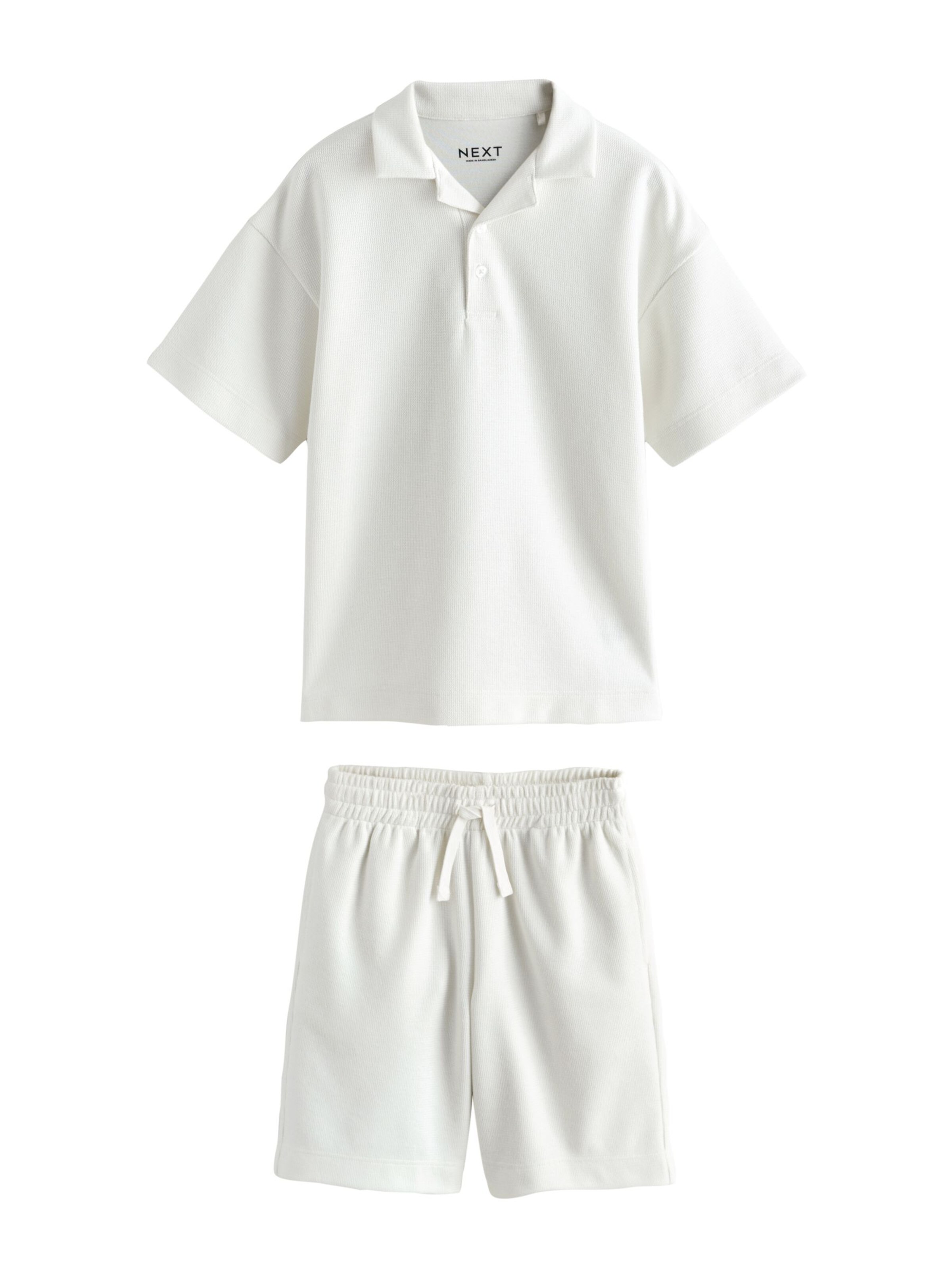 Next Set in Wit: voorkant