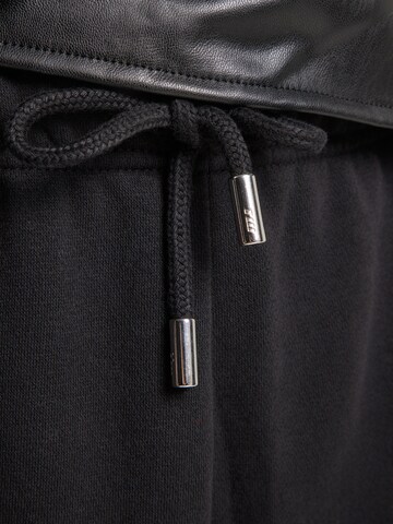 Tally Weijl Zwężany krój Spodnie w kolorze czarny