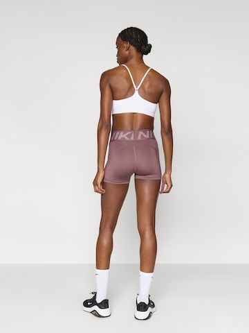 NIKE Skinny Παντελόνι φόρμας σε λιλά