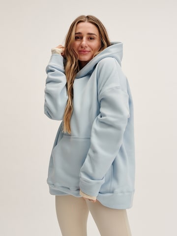 Tatiana Zidekova Μπλούζα φούτερ σε μπλε: μπροστά