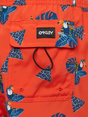 OAKLEY Regular Boardshorts 'TOUCAN TROPICS' i orange