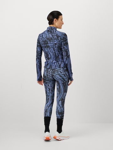 NIKE Skinny Παντελόνι φόρμας 'SWIFT' σε μπλε