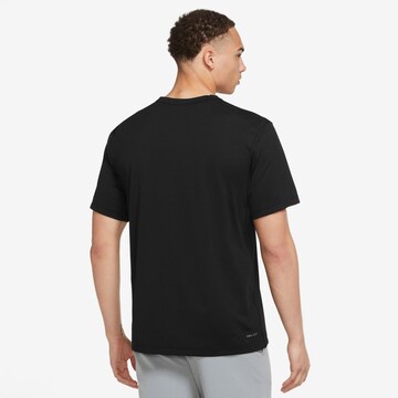 Tricou funcțional 'Hyverse' de la NIKE pe negru