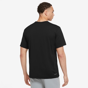 NIKE Λειτουργικό μπλουζάκι 'Hyverse' σε μαύρο