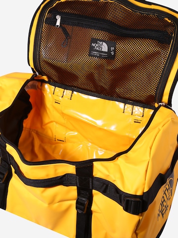 THE NORTH FACE Cestovní taška – žlutá