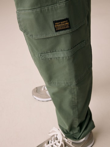 Next Конический (Tapered) Штаны в Зеленый