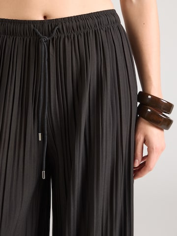 Hailys - Perna larga Calças 'Fa44biola' em preto