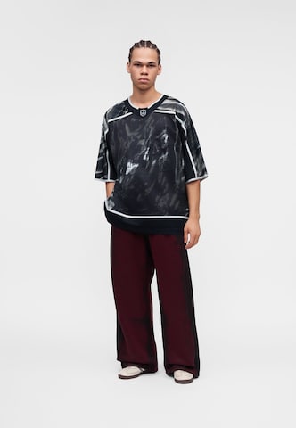 ADIDAS ORIGINALSWide Leg/ Široke nogavice Hlače 'Adilenium 6' - crvena boja: prednji dio
