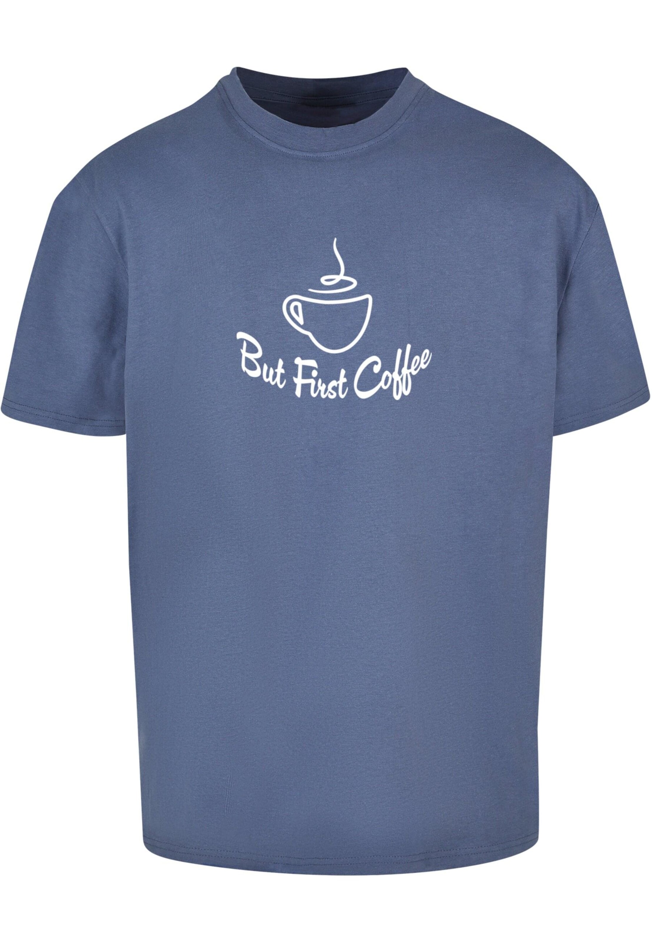 Merchcode Shirt 'But First Coffee' in Blauw: voorkant
