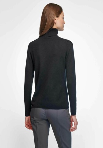 include Rollkragen-Pullover in Schwarz