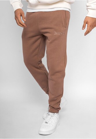 Dropsize Tapered Pants in Brown: front