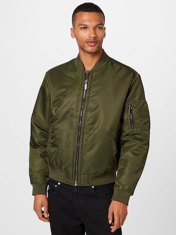 Calvin Klein - Chaqueta de entretiempo 'Hero' en verde: frente