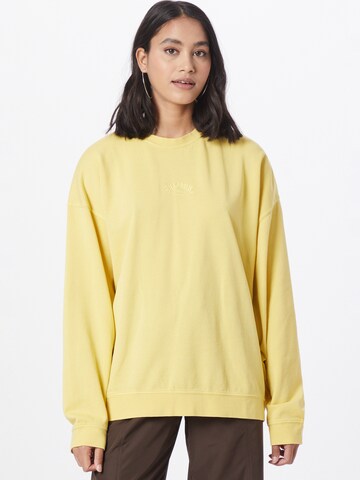 BILLABONGSweater majica 'Ride In' - žuta boja: prednji dio