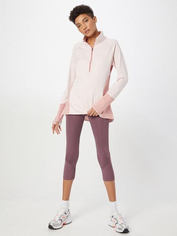 Maglietta di UNDER ARMOUR in rosa