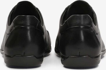 Chaussure de sport à lacets Kazar en noir