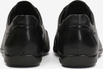 melns Kazar Sporta apavi ar šņorēm