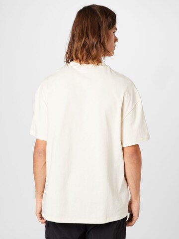 Maglietta di PUMA in bianco